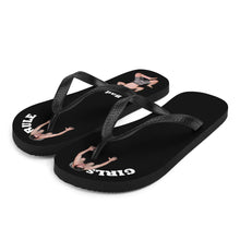 comfortable-womens-girls-rule-black-fabric-topped-flip-flops-sandals-men-bow-under-toes-one-tiny-man-crushed-under-heel-bad-boy-next-to-him-front-left-view