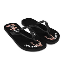 comfortable-womens-girls-rule-black-fabric-topped-flip-flops-sandals-men-bow-under-toes-one-tiny-man-crushed-under-heel-bad-boy-next-to-him-front-right-view