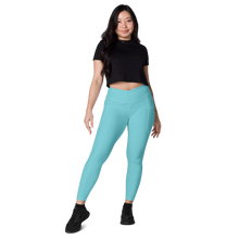 average-size-woman-viral-robin-egg-blue-high-waist-crossover-leggings-front-view