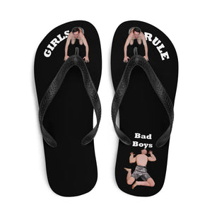 comfortable-womens-girls-rule-black-fabric-topped-flip-flops-sandals-men-bow-under-toes-one-tiny-man-crushed-under-heel-bad-boy-next-to-him-top-view