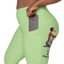 plus-size-woman-viral-pale-green-high-waist-crossover-leggings-pocket-side-view