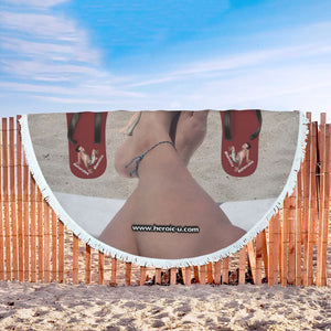 Girls TOEtally Rule round beach with a tiny man between your toes fence view